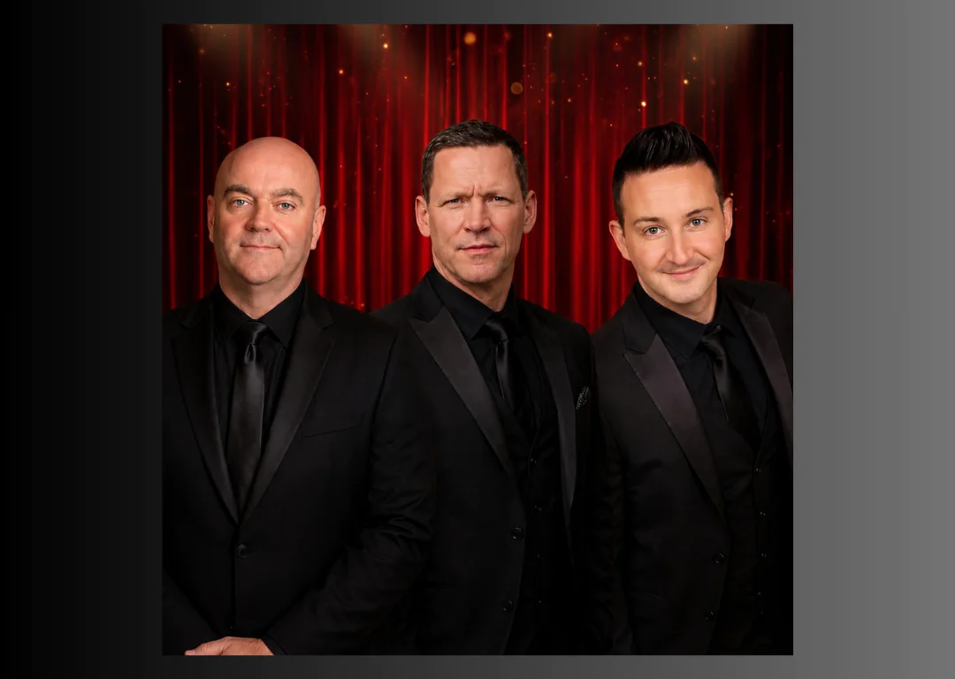 Enjoy a night of live entertainment with our talented performers at the hotel, set against elegant red curtains.