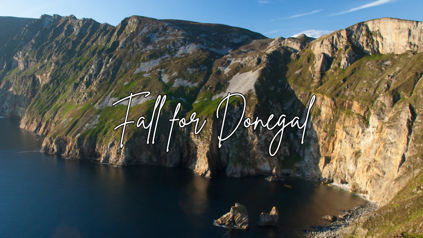 Dramatic sea cliffs in Donegal with bright blue sky, inviting guests to explore scenic coastal views and natural beauty.