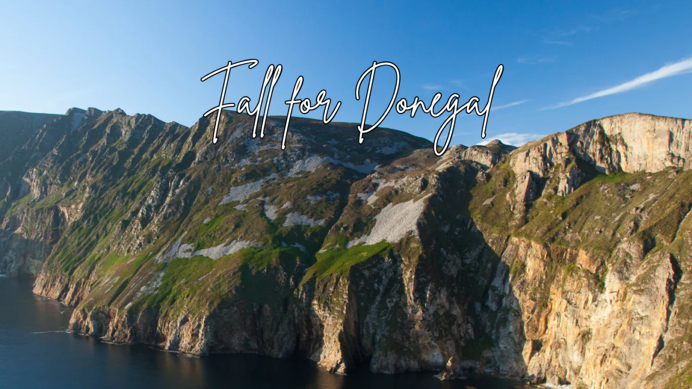Breathtaking view of Donegal cliffs under a clear blue sky, perfect for travellers seeking serene, coastal Irish vistas.